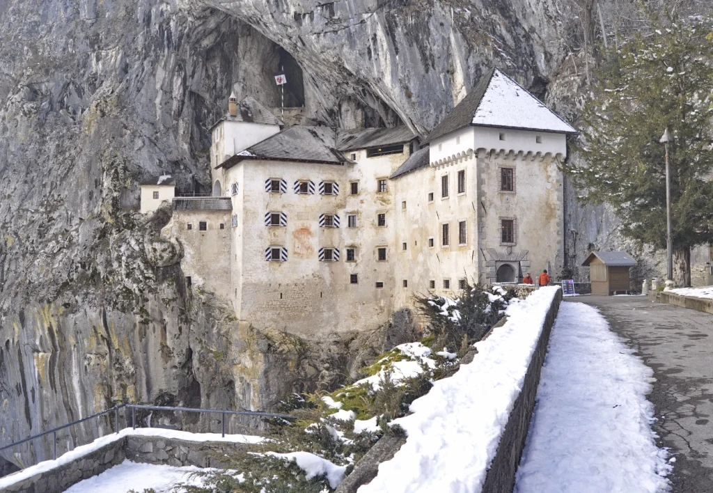 Predjama castle winter view snowy landscape